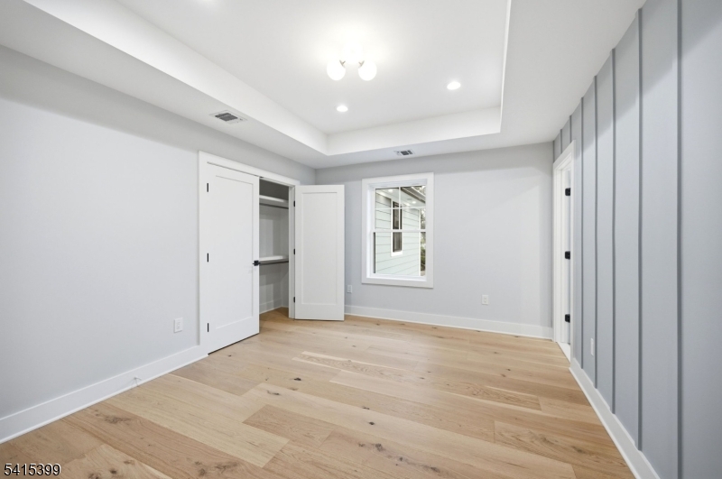 41 Orchard Road Florham Park, NJ 07932 - Photo 23 of 34 a view of livingroom with hardwood floor and window