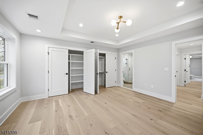 41 Orchard Road Florham Park, NJ 07932 - Photo 24 of 34 wooden floor in an empty room with a window