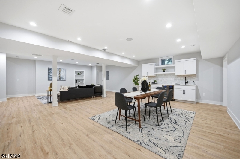 41 Orchard Road Florham Park, NJ 07932 - Photo 28 of 34 a view of a dining room with furniture and wooden floor