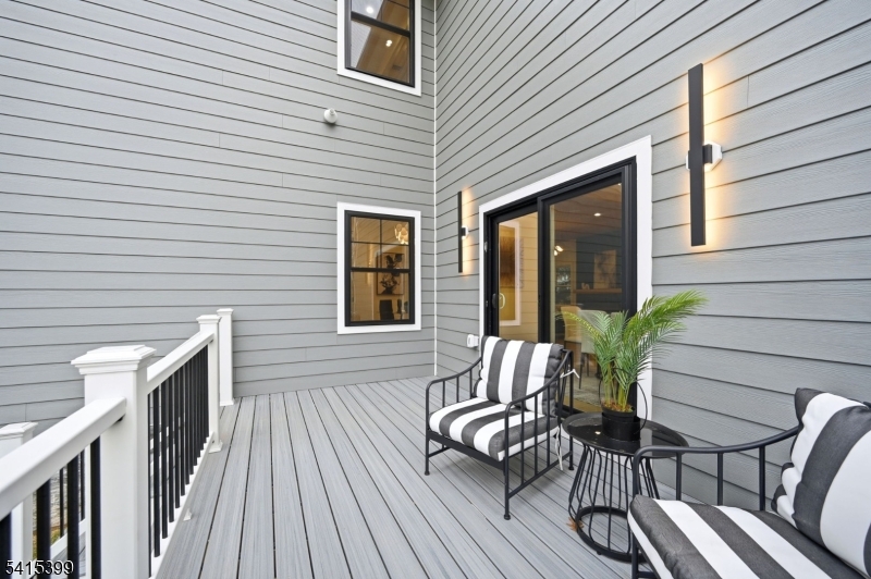 41 Orchard Road Florham Park, NJ 07932 - Photo 31 of 34 a view of a patio with two chairs and table in a patio