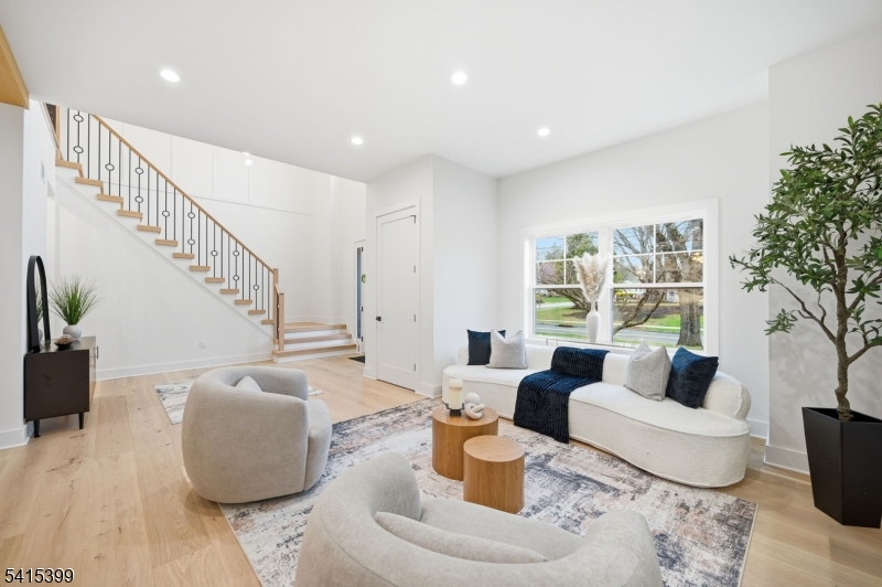 41 Orchard Road Florham Park, NJ 07932 - Photo 4 of 34 a living room with furniture and a large window