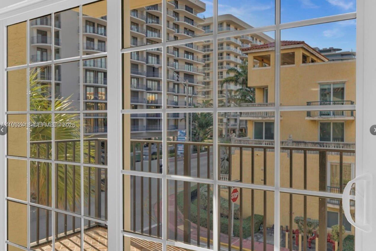 8900 Collins Avenue, Unit 304 Surfside, FL 33154 - Photo 18 of 18 a view of a building with a window