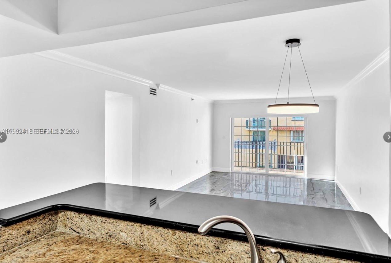 8900 Collins Avenue, Unit 304 Surfside, FL 33154 - Photo 10 of 18 a room with a large window