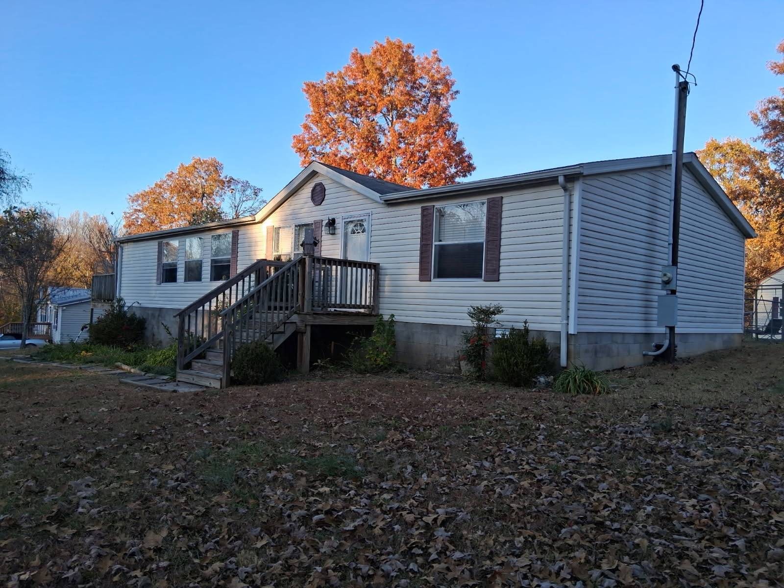 318 Autumn Road Morrison, TN 37357 - Photo 14 of 17 a view of a house with a yard