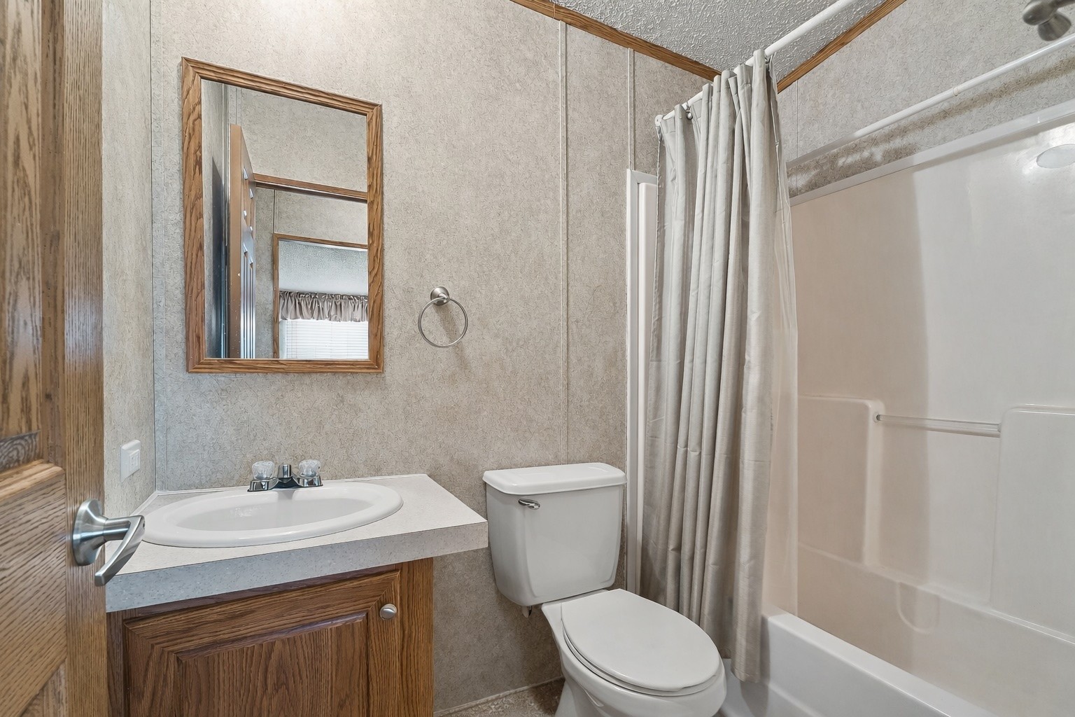 318 Autumn Road Morrison, TN 37357 - Photo 7 of 17 a bathroom with a granite countertop sink toilet and shower