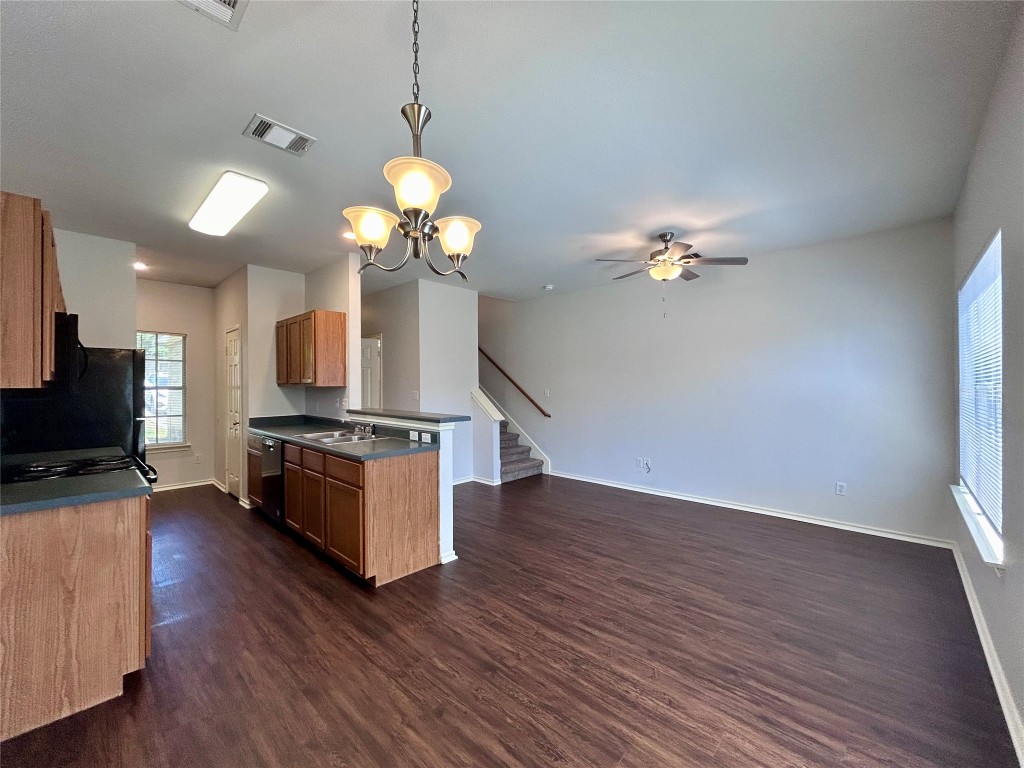 12307 Abney Drive Austin, TX 78729 - Photo 6 of 18 a living room with fireplace furniture and a flat screen tv