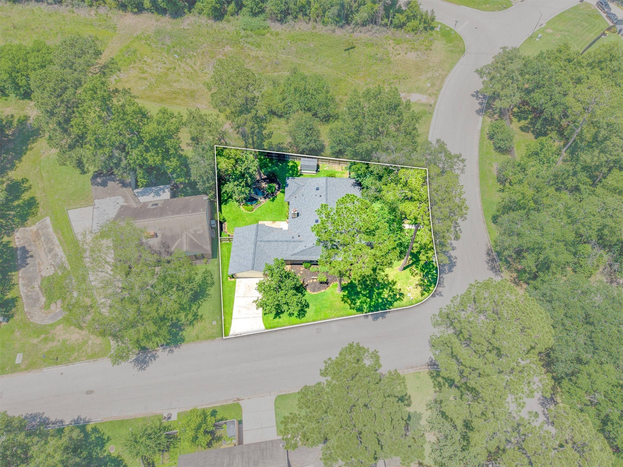 826 North Rivershire Drive Conroe, TX 77304 - Photo 41 of 46 Aerial with lot outline (wider)
