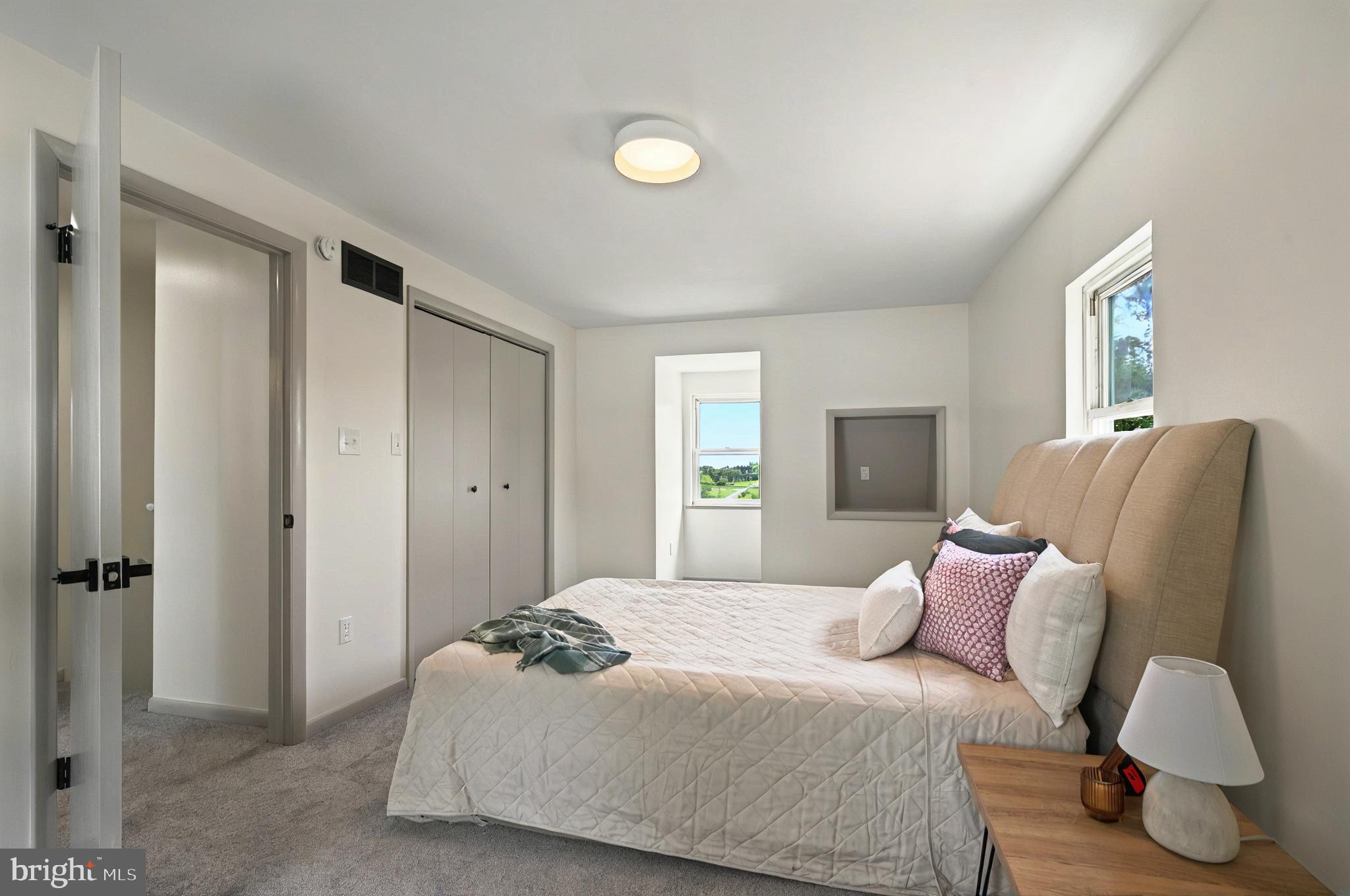 222 Old Racetrack Road Parkesburg, PA 19365 - Photo 23 of 37 a bedroom with a bed and window
