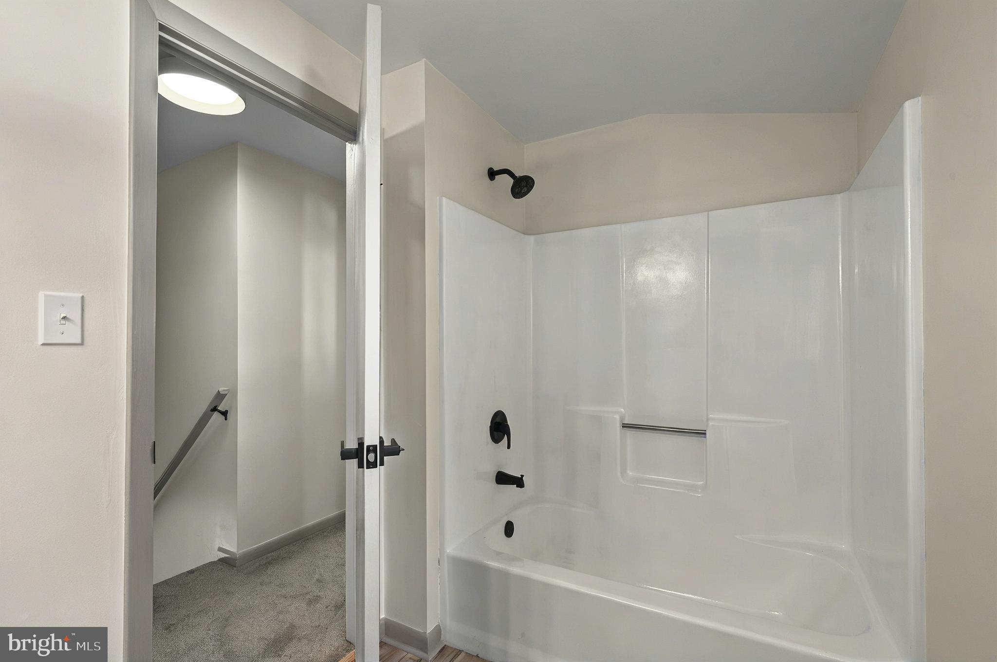 222 Old Racetrack Road Parkesburg, PA 19365 - Photo 25 of 37 a bathroom with a bathtub