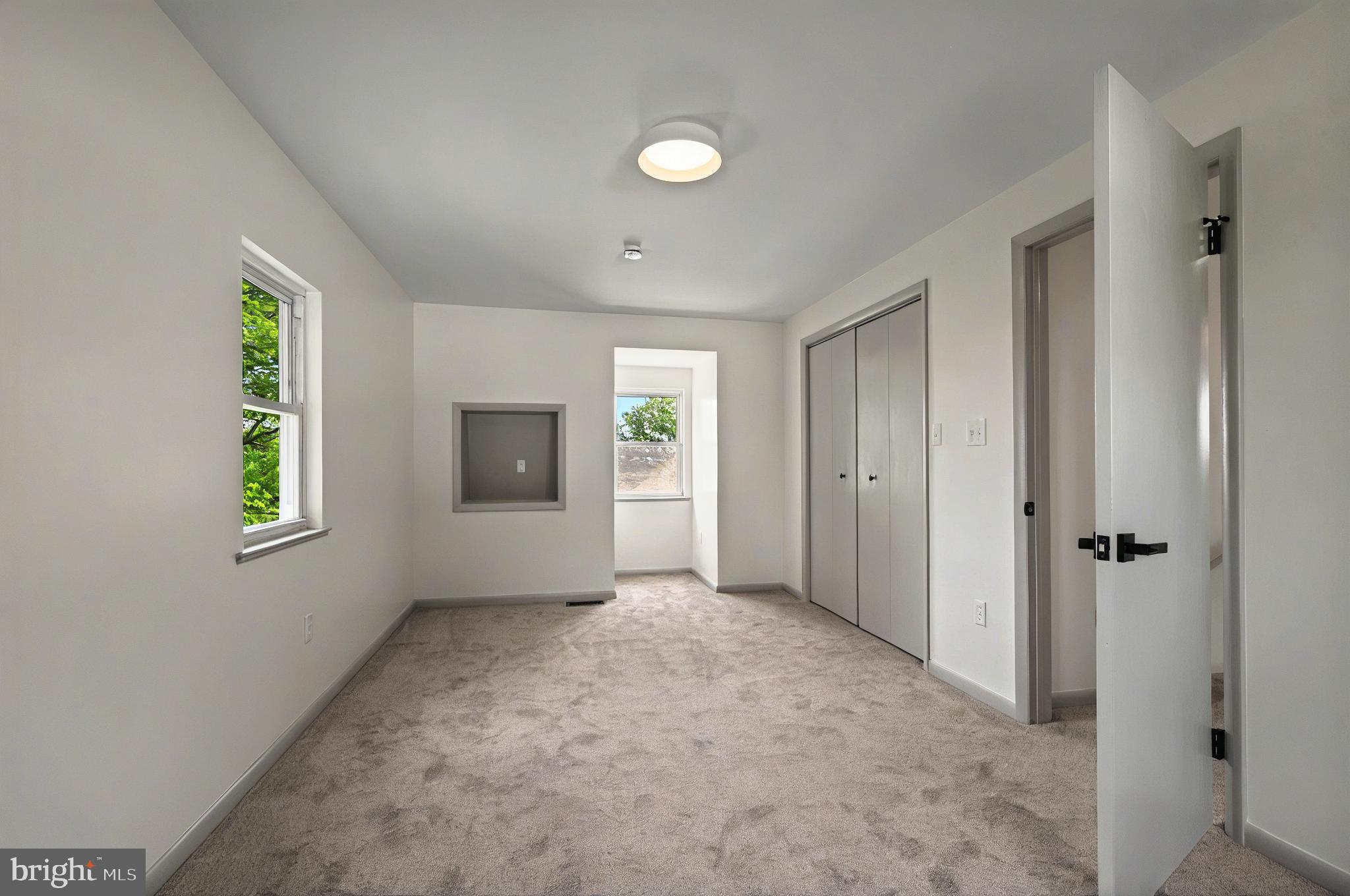 222 Old Racetrack Road Parkesburg, PA 19365 - Photo 27 of 37 a view of an empty room with window and closet area