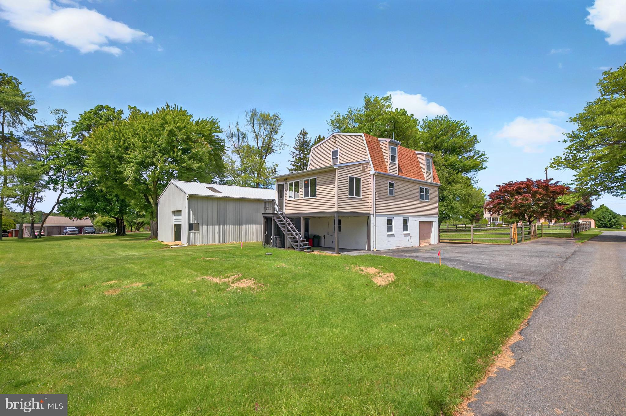 222 Old Racetrack Road Parkesburg, PA 19365 - Photo 33 of 37 a house view with a garden space