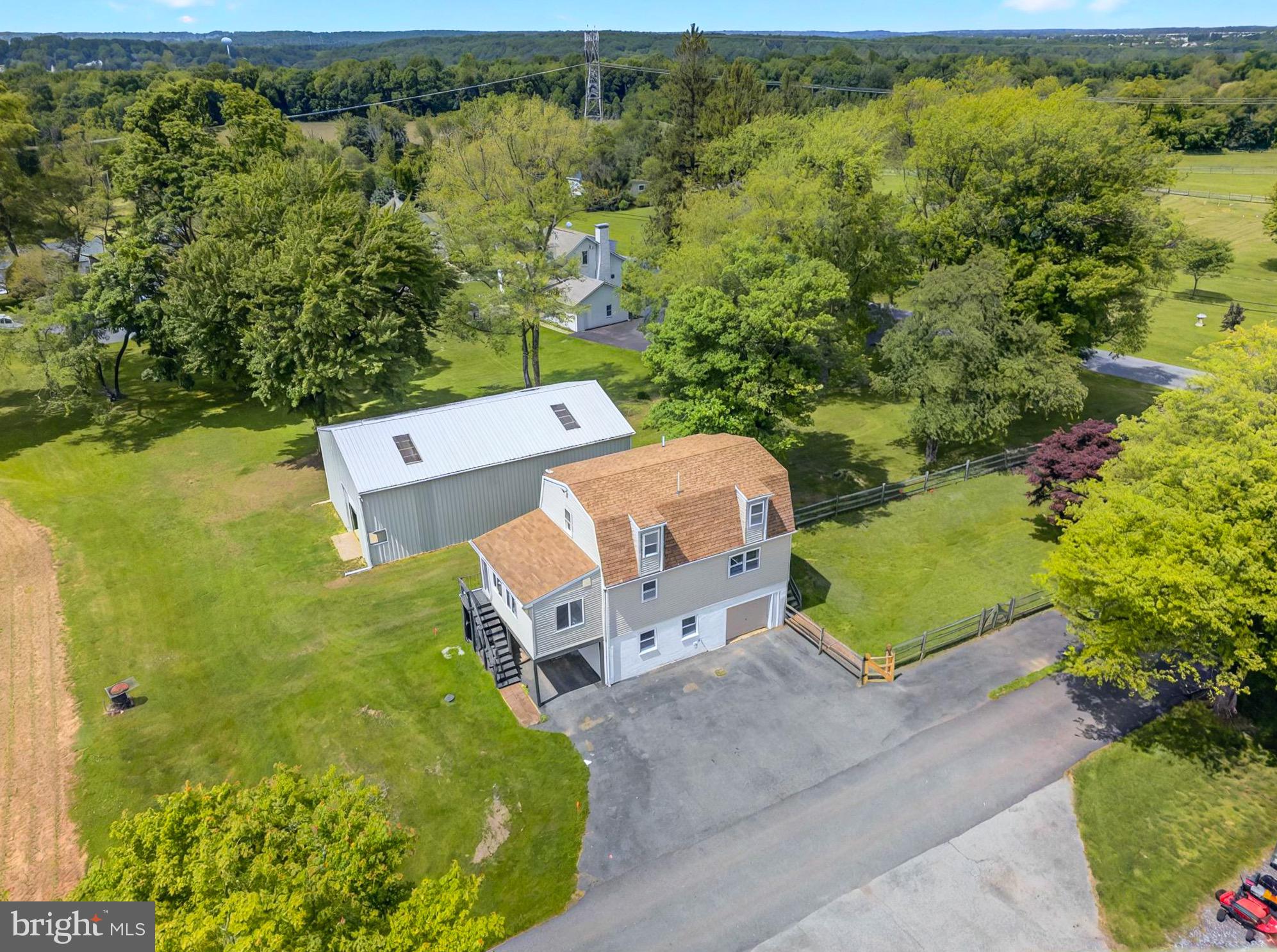 222 Old Racetrack Road Parkesburg, PA 19365 - Photo 34 of 37 an aerial view of a house with a yard lake view