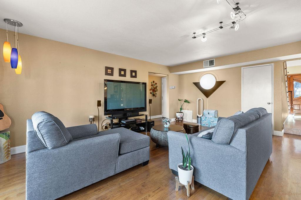 35664 Lundy Drive Newark, CA 94560 - Photo 14 of 34 a living room with furniture and a flat screen tv