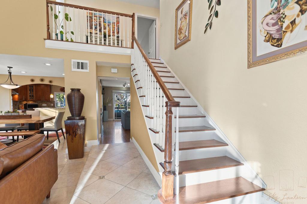 35664 Lundy Drive Newark, CA 94560 - Photo 17 of 34 a hallway with a stove and a white cabinet
