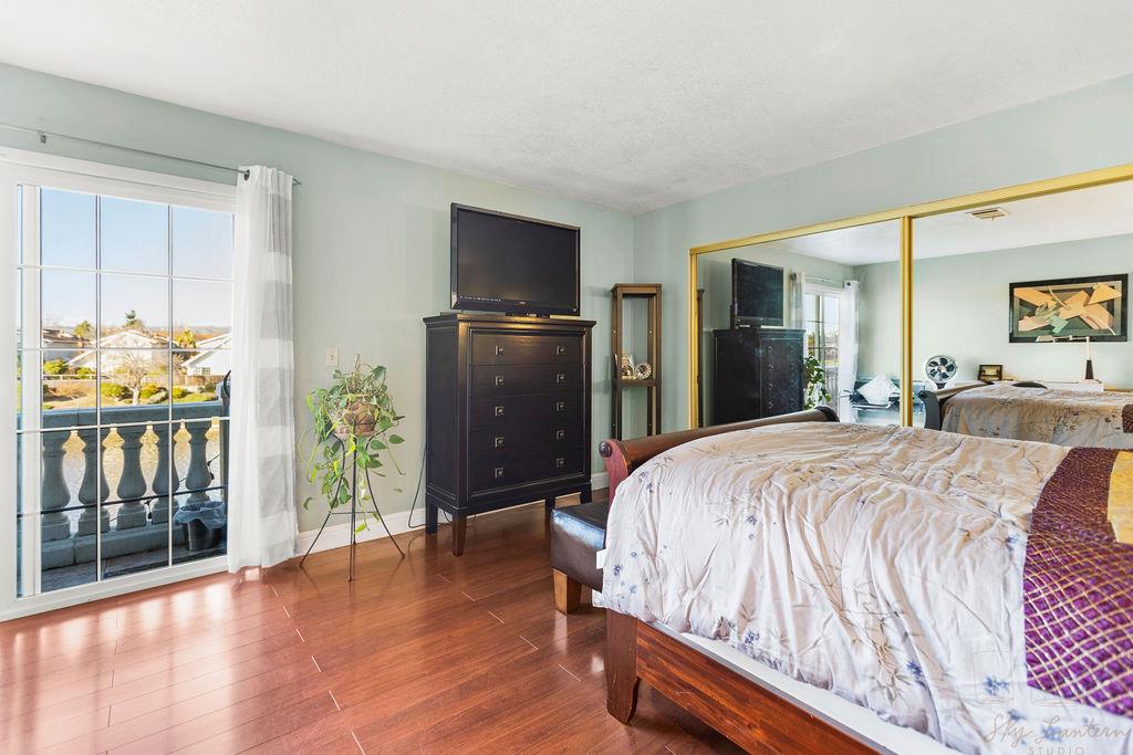 35664 Lundy Drive Newark, CA 94560 - Photo 21 of 34 a bed sitting in a spacious bedroom next to a window