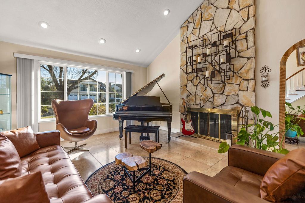 35664 Lundy Drive Newark, CA 94560 - Photo 8 of 34 a living room with furniture or couch and a floor to ceiling window