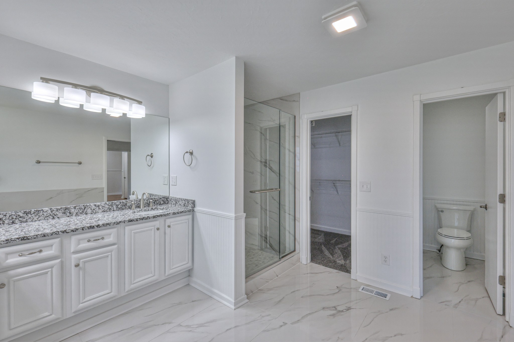 1380 Haley Road Watertown, TN 37184 - Photo 35 of 95 a spacious bathroom with a granite countertop sink and a mirror