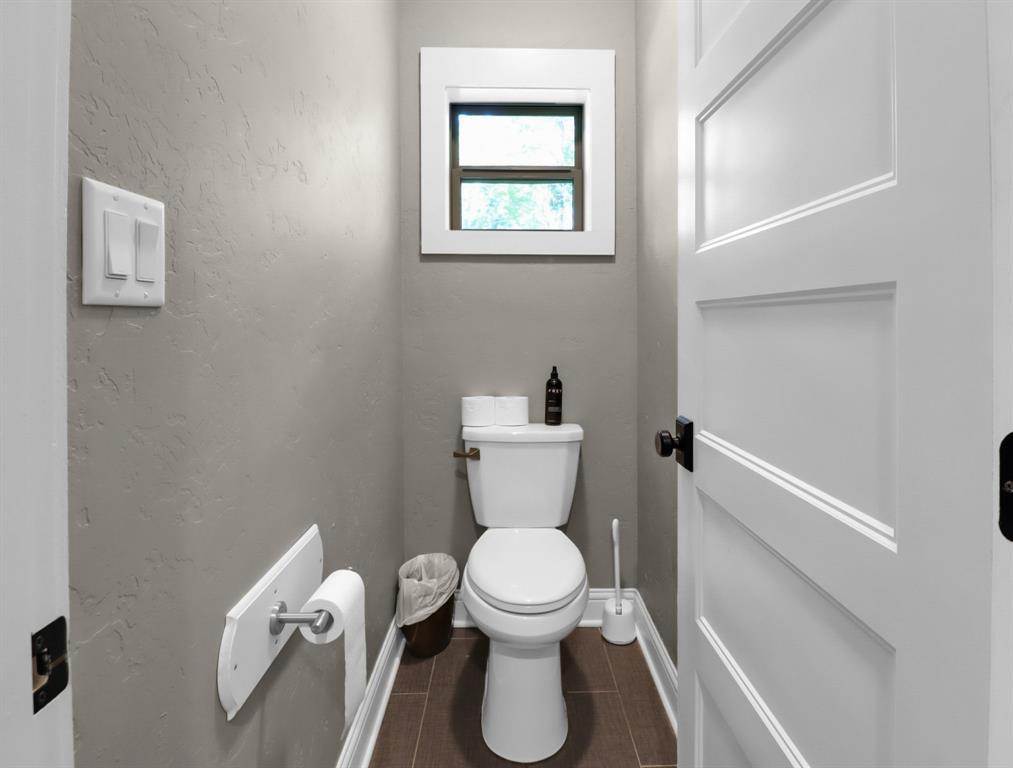 491 Hall Drive Longview, TX 75605 - Photo 25 of 40 Private toilet room in Jack & Jill style bathroom.