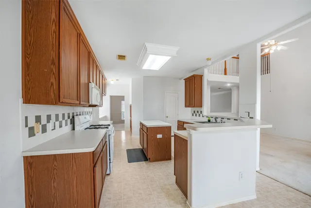 a bathroom with a sink double vanity and a mirror