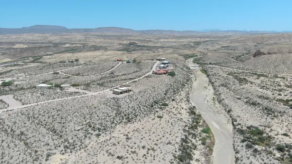a view of ocean and mountain