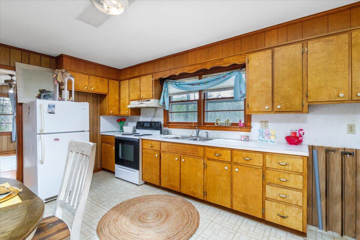 6463 Dry Hill Road Ferrum, VA 24088 - Photo 11 of 41 a kitchen with cabinets a sink and appliances