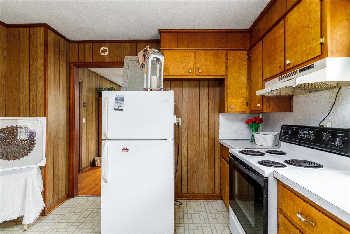 6463 Dry Hill Road Ferrum, VA 24088 - Photo 16 of 41 a white refrigerator freezer and a stove