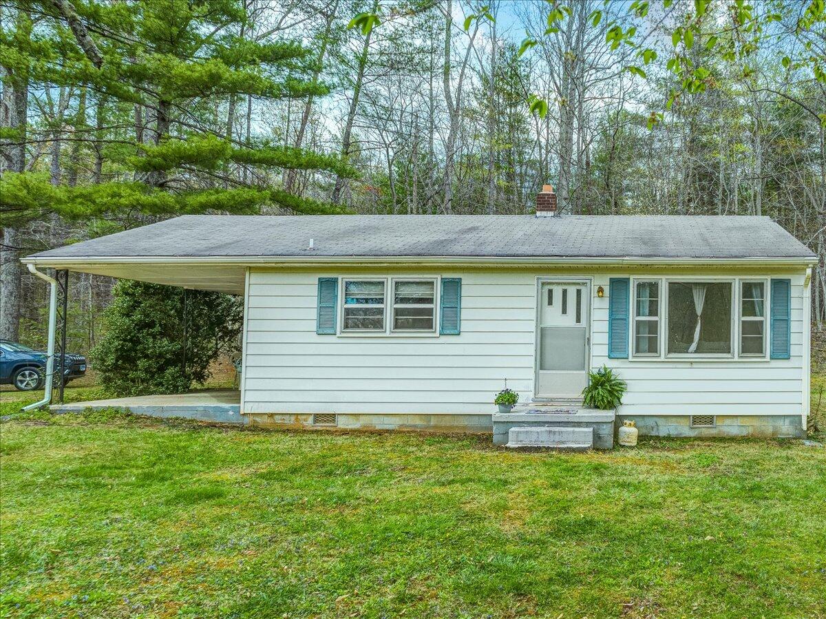 6463 Dry Hill Road Ferrum, VA 24088 - Photo 23 of 41 a view of a house with a backyard