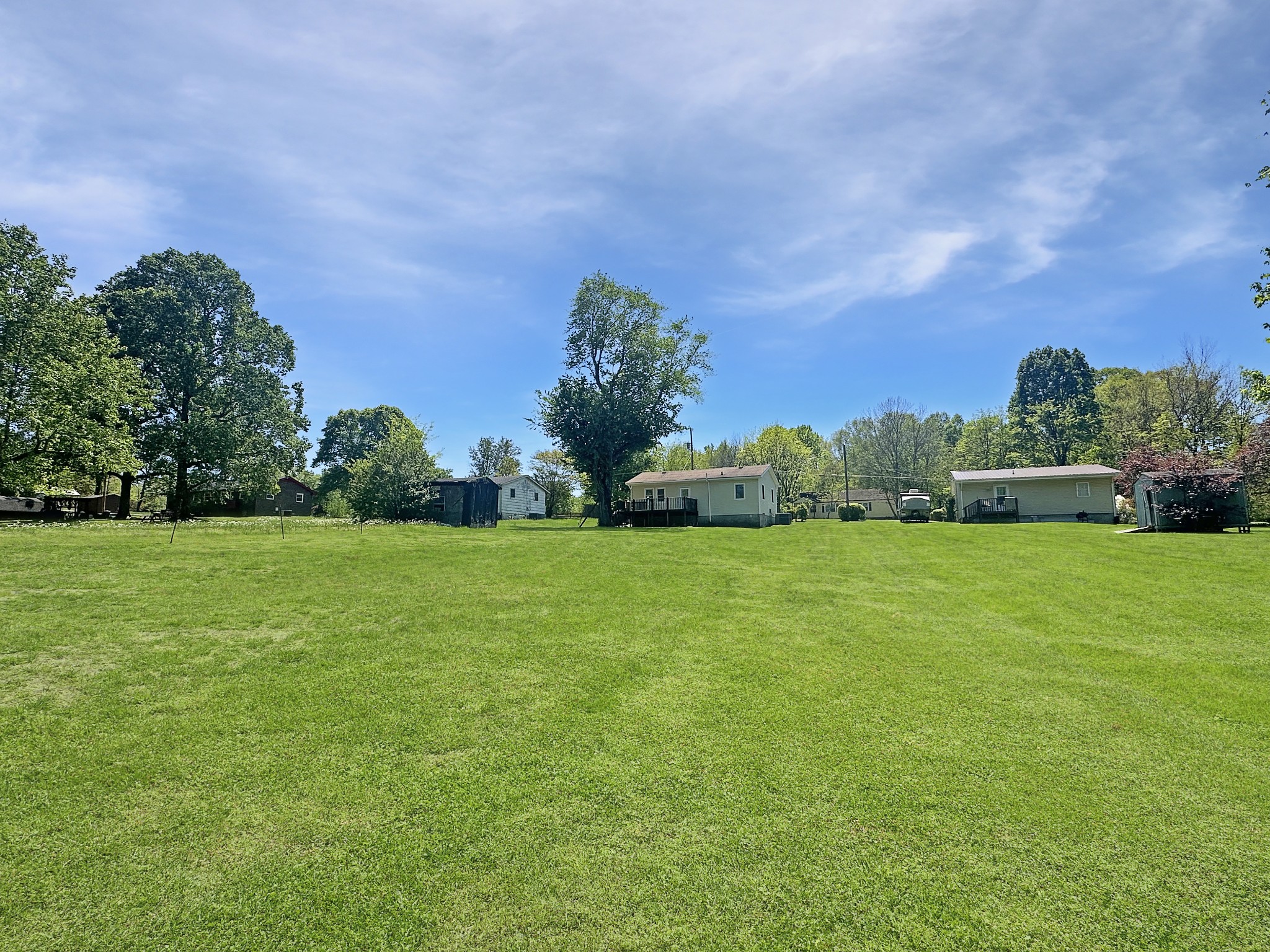 7526 South Swift Road Goodlettsville, TN 37072 - Photo 13 of 15 a view of a field with grass and trees