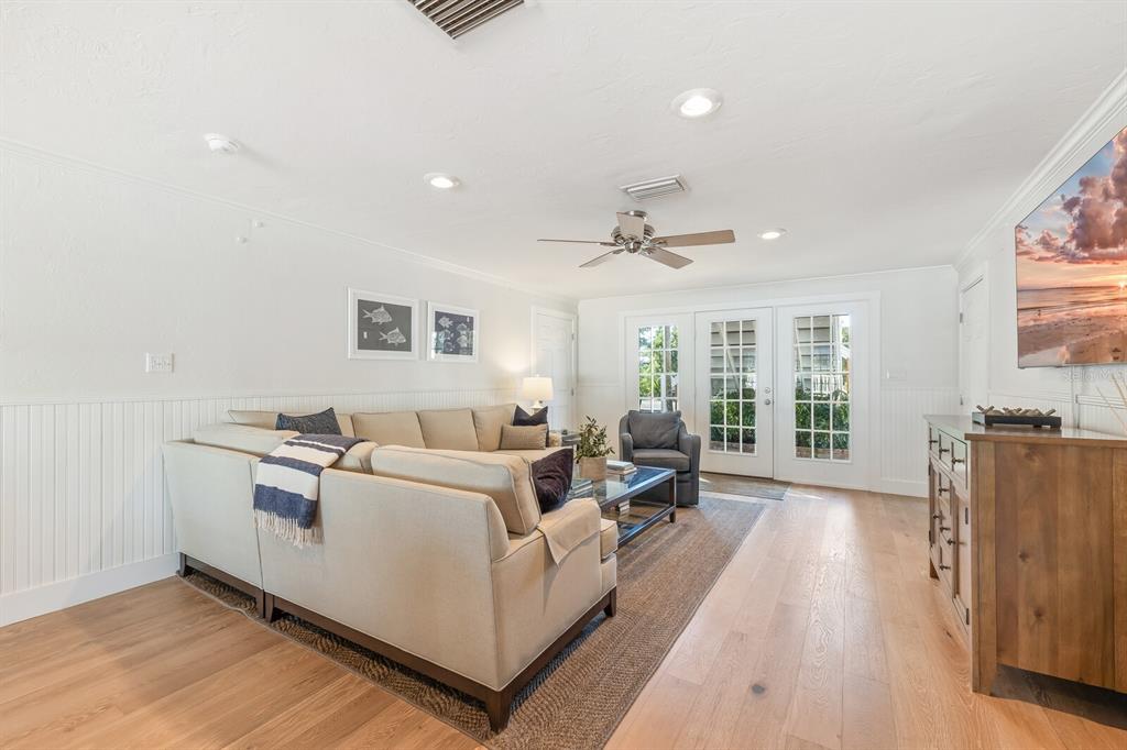 161 1st Street East Boca Grande, FL 33921 - Photo 15 of 38 a bed room with a bed and a large window