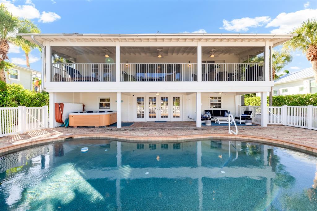 161 1st Street East Boca Grande, FL 33921 - Photo 28 of 38 a house view with swimming pool and sitting space