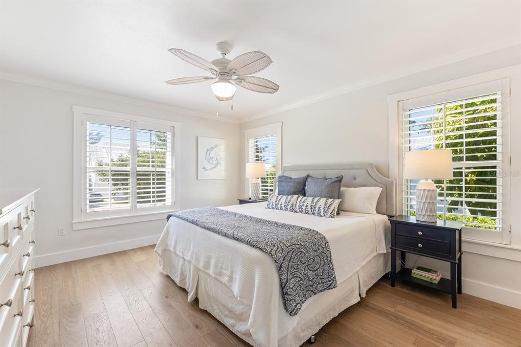 161 1st Street East Boca Grande, FL 33921 - Photo 8 of 38 a bedroom with a bed and a window