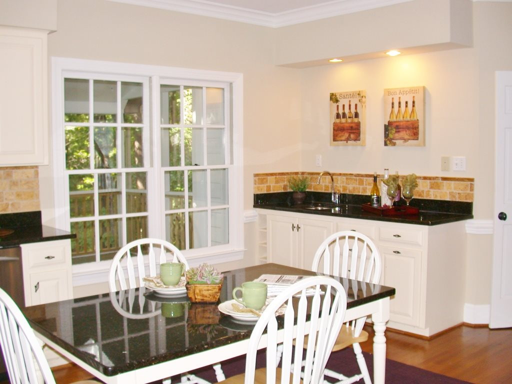 11604 Chipaway Court Raleigh, NC 27614 - Photo 5 of 25 Granite counter top bar area - perfect to set appetizers or drinks on when having guests! Kitchen