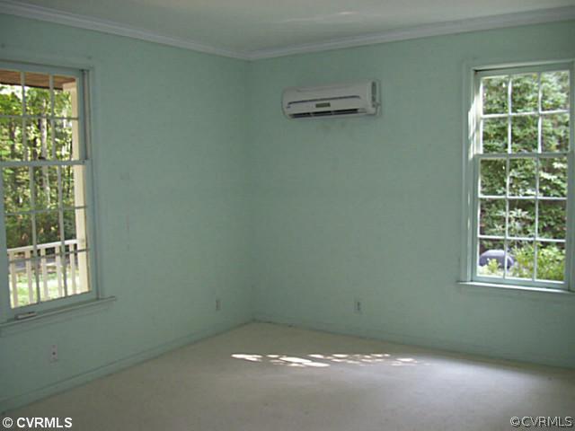 14120 Nash Road Chesterfield, VA 23838 - Photo 13 of 21 a view of an empty room with a window