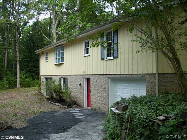 14120 Nash Road Chesterfield, VA 23838 - Photo 20 of 21 a front view of a house with garden