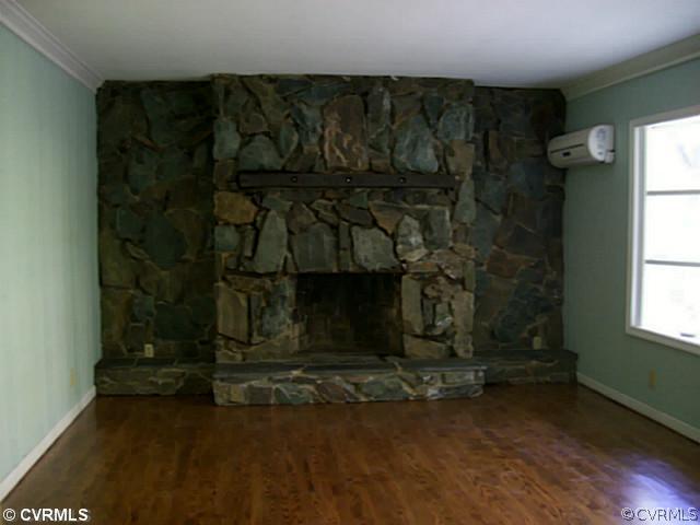 14120 Nash Road Chesterfield, VA 23838 - Photo 7 of 21 a room with a fireplace