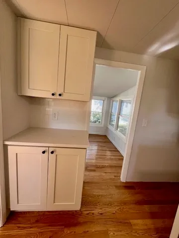 a view of room and cabinets