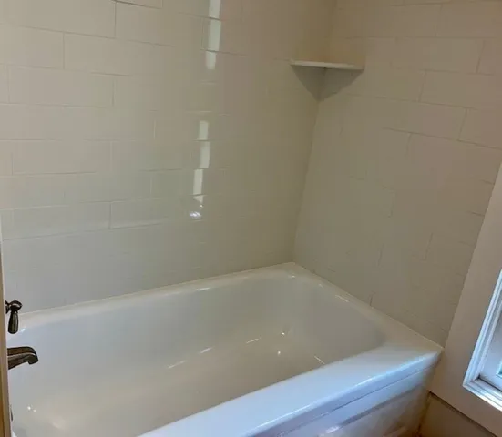 a bathroom with a tub