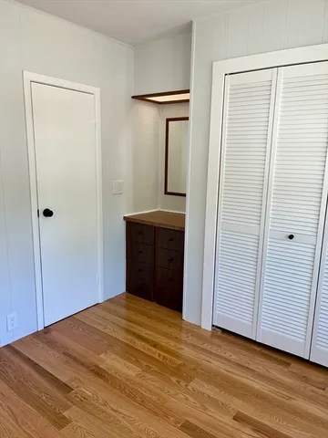 a bathroom with a sink and mirror