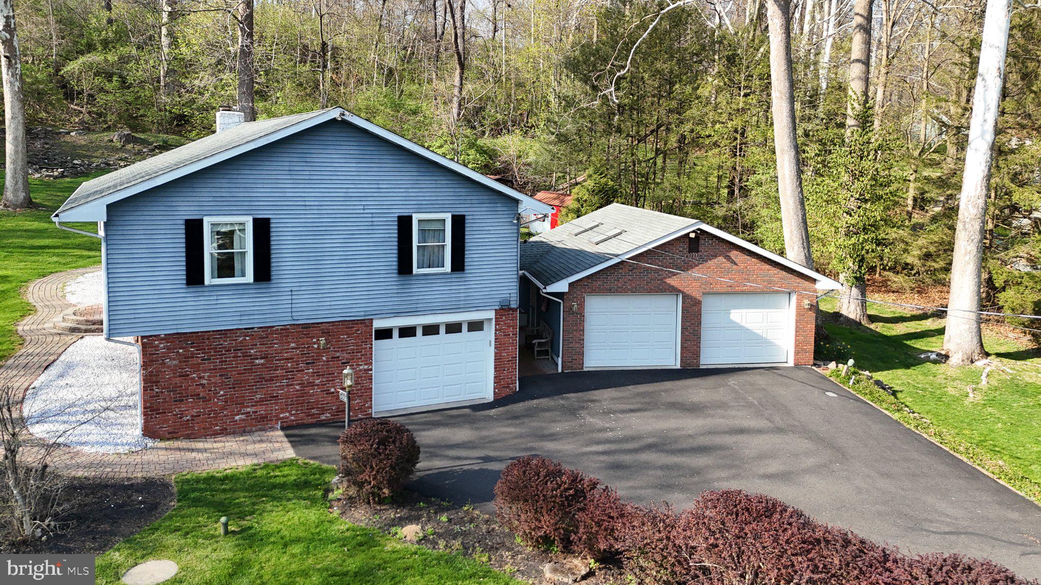 3005 Funks Mill Road Riegelsville, PA 18077 - Photo 3 of 41 Charming home nestled in lush greenery.