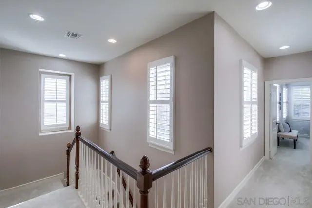 a view of street with parked cars