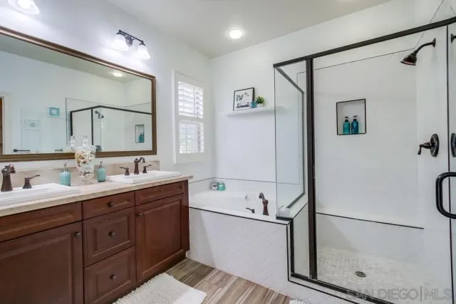 a white toilet sitting next to a window
