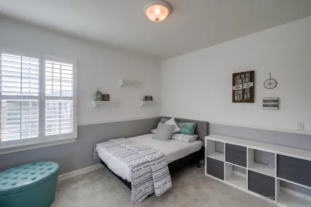 front view of a house with a garden