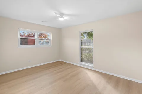 an empty room with windows
