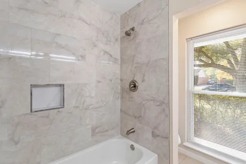 a bathroom with a bathtub