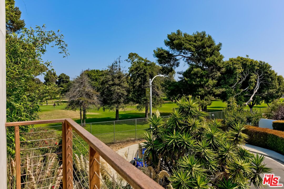 a view of a backyard with plants