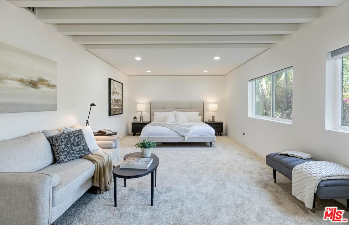 899 Commonwealth Avenue Venice, CA 90291 - Photo 20 of 47 a spacious bedroom with a bed and a couch