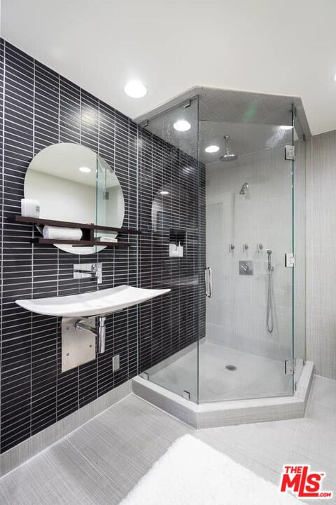 899 Commonwealth Avenue Venice, CA 90291 - Photo 24 of 47 a bathroom with a shower and a sink