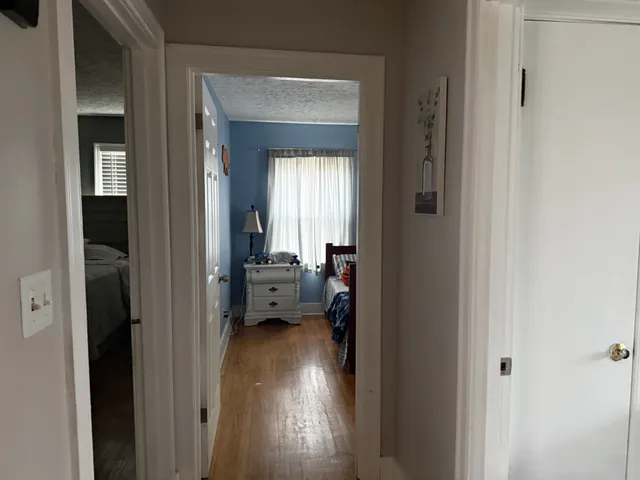 a en suite bathroom with a sink and a mirror