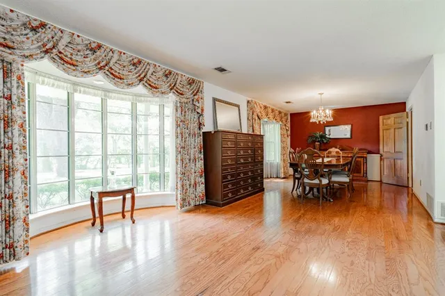 a living room with fireplace furniture and a fireplace