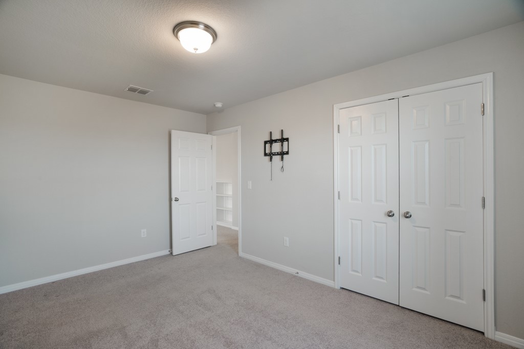 205 Guemal Road Buda, TX 78610 - Photo 23 of 33 a view of an empty room